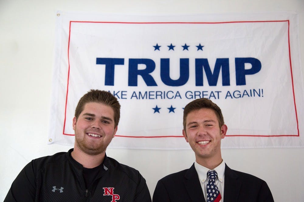Casey Kinsey, political director for the OU College Republicans, and David Parkhill, president of the OU College Republicans, pose for a portrait on September 27, 2016 at their apartment. Both Kinsey and Parkill are student volunteers for Donald Trump's campaign. 