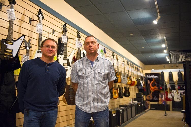 Guitar gurus' music store sees boom in success  
