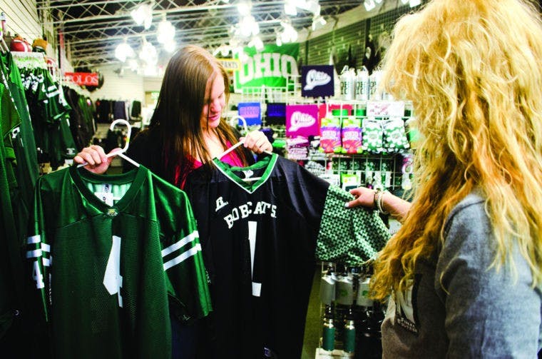 OU victories boost sales for Uptown apparel shops  