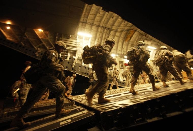 AP SLIDESHOW: Obama to withdraw troops from Iraq by 'the Holidays'  