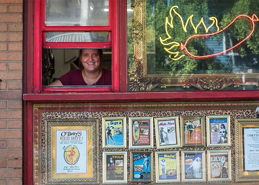 Sarah Slater, a kitchen manager at O'Betty's Red Hot, poses for a portrait at the hot dog restaurant on October 3, 2016.  (OLIVER HAMLIN | FOR THE POST)