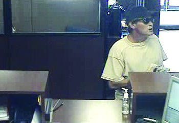 Man arrested as suspect in August bank robbery  