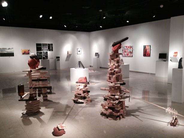 Visiting artists and scholars chose 40 pieces for a student art exhibition  