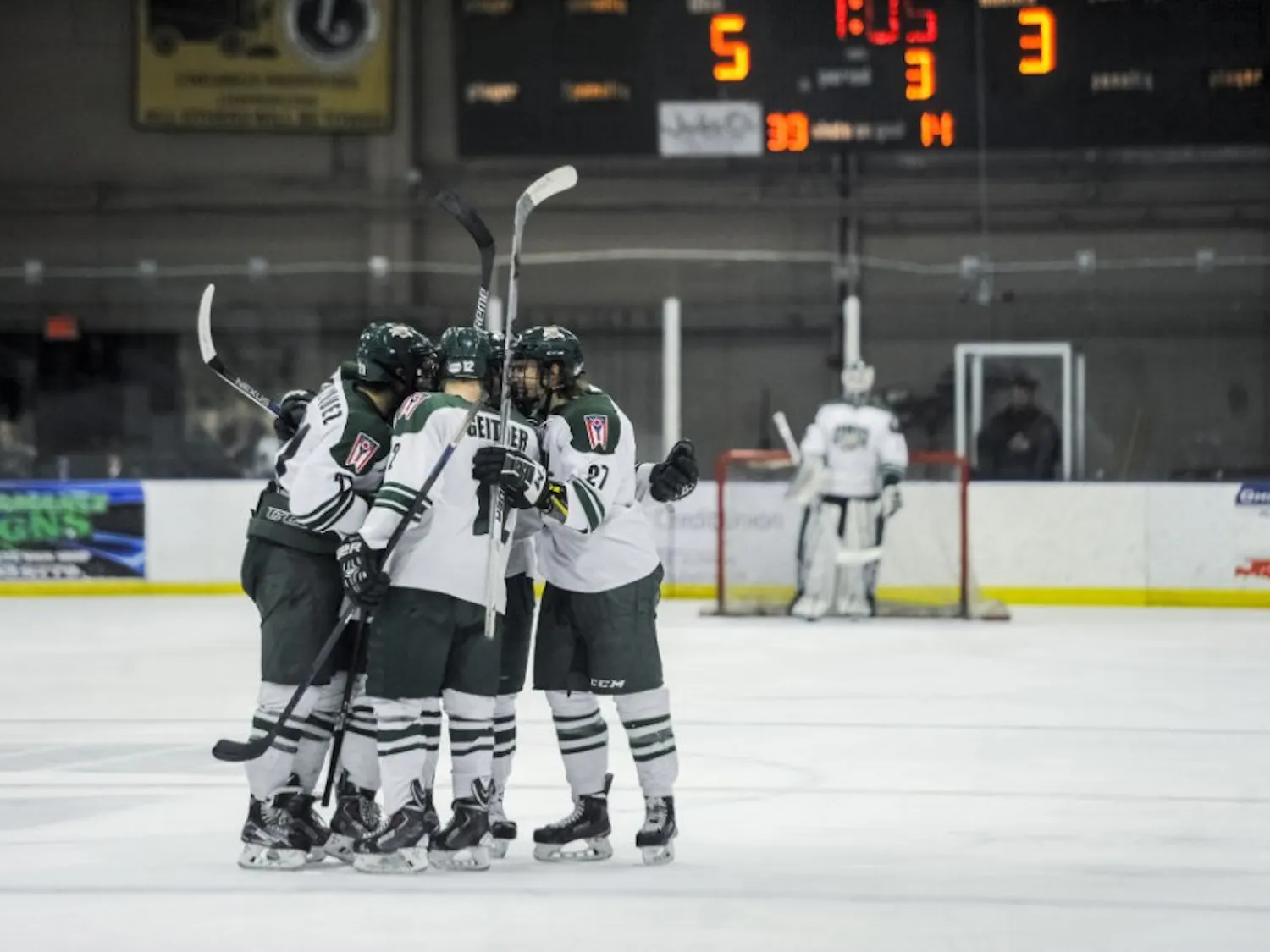 Hockey huddle celebrate
