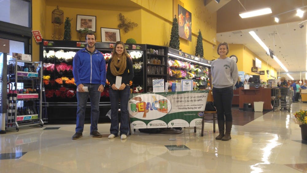 Jennifer Yoder right, with students volunteers advocating for diabetes awareness month at Kroger.