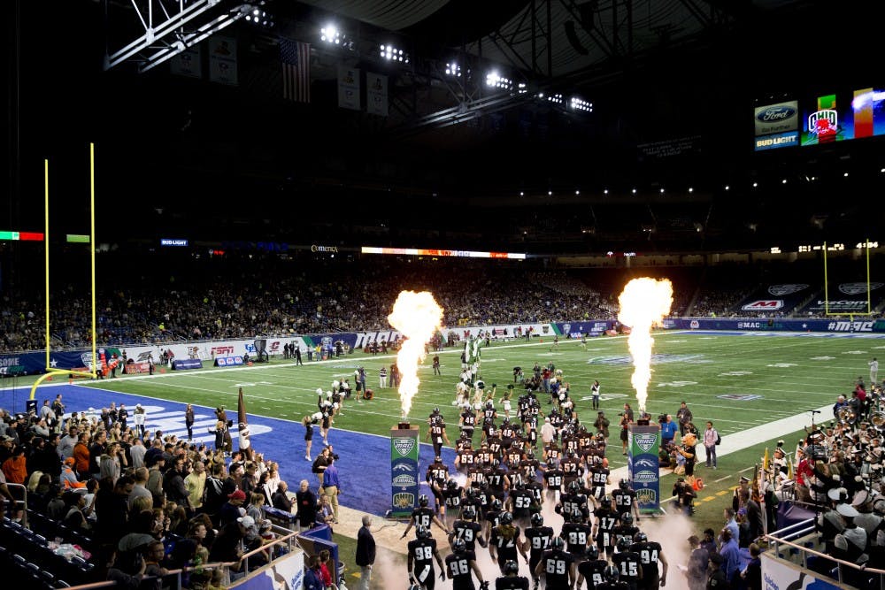 The Ohio Bobcats run out onto Ford Field before the start of the MAC Championship game against Western Michigan. A late Bronco interception sealed a 29-23 loss for Ohio. 