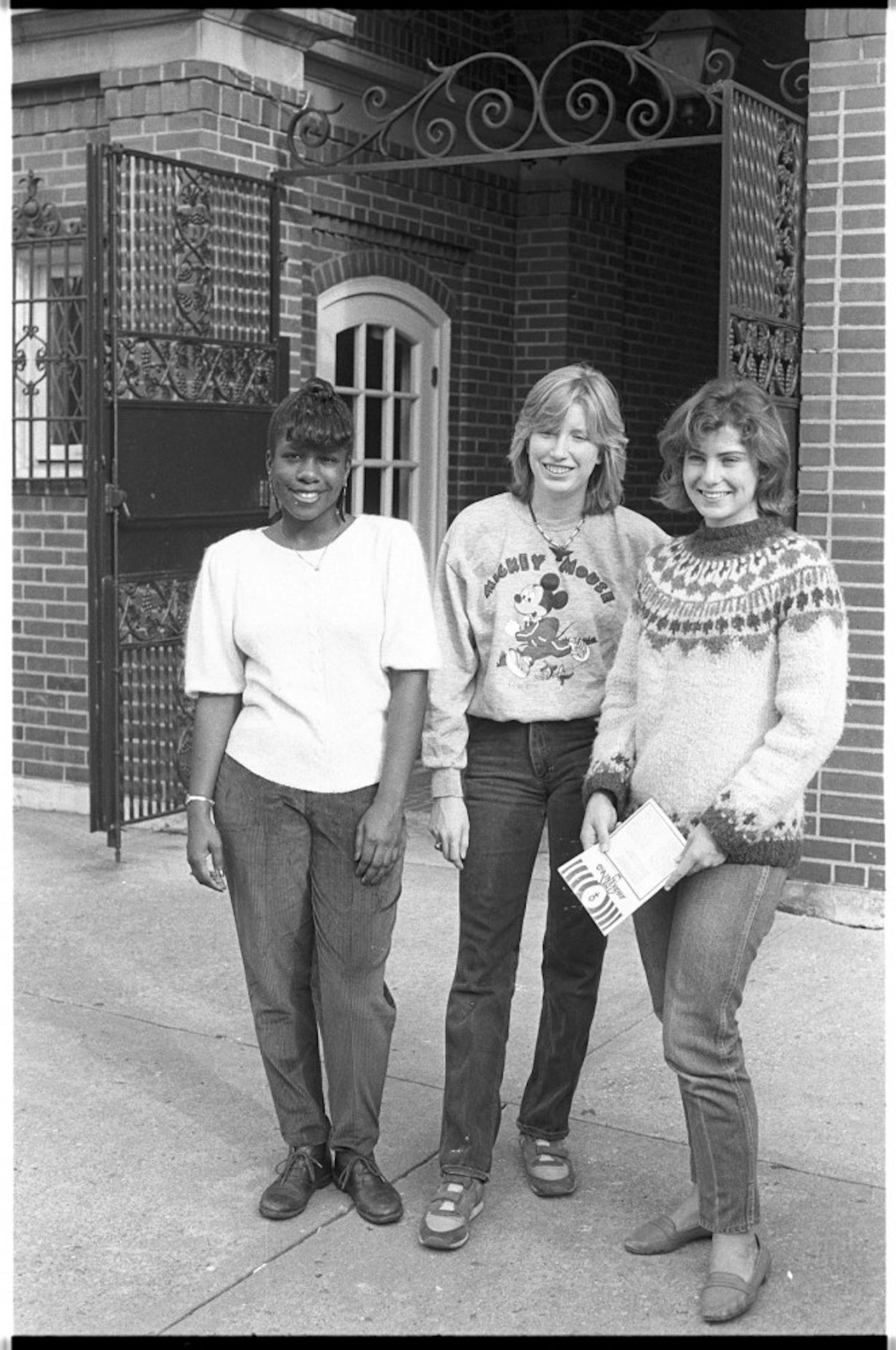 Women's Studies students stand in Scott Quad entrance, 1985  