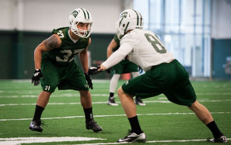 Football: Defense comes out strong in Green & White game  