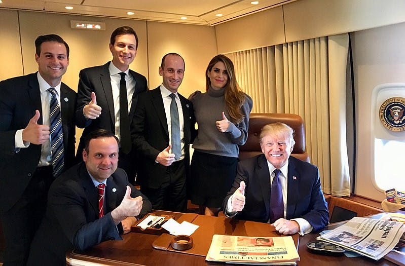 800px-Donald_Trump_and_staff_on_Air_Force_One.jpg