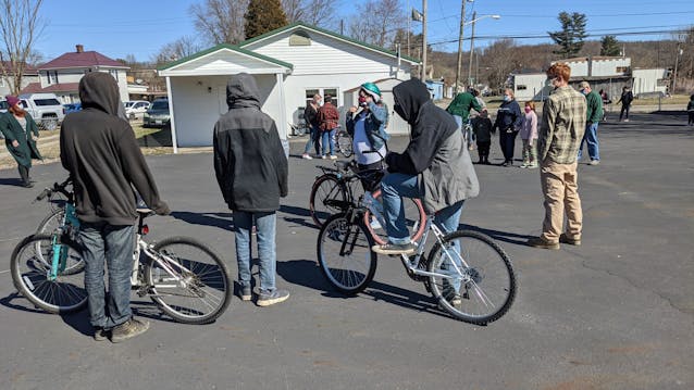Re-Cycle - Chauncey residents with new-to-them bicycles in the Senior Center parking lot.jpg