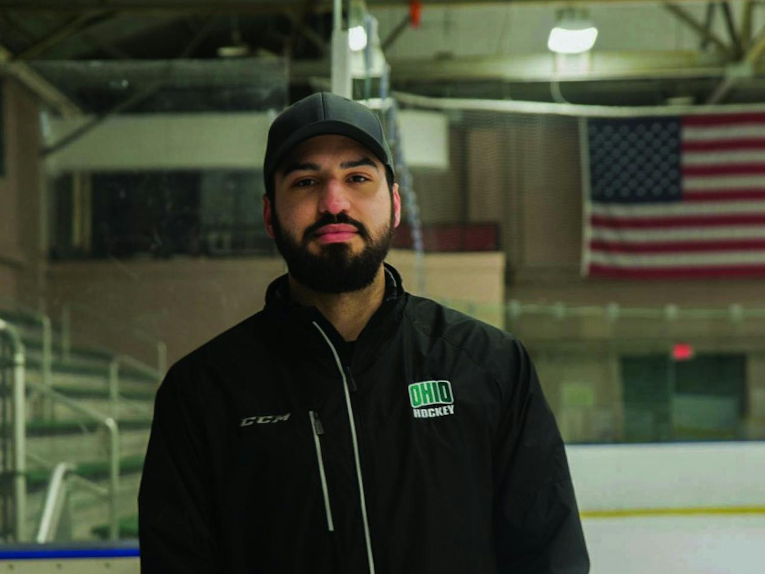 Assistant coach Nathan De La Torre poses for a portrait after practice on January 31, 2017. De La Torre has transitioned from being a player to a coach for the same team. 