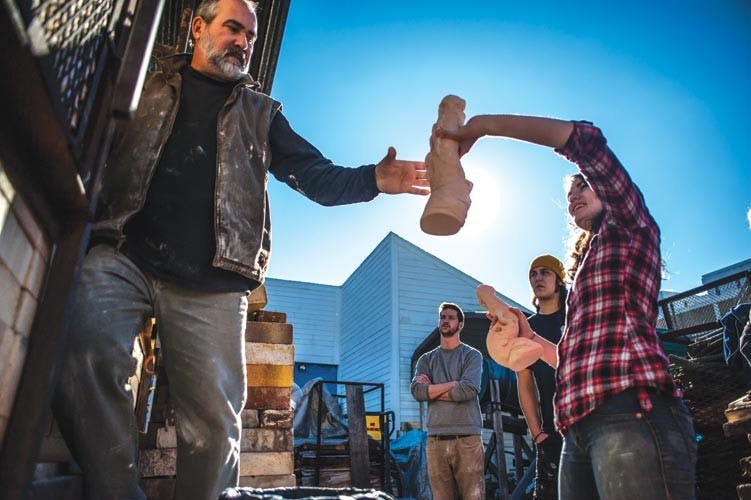 OU ceramics students open doors for OSU students without wood-fired kilns  