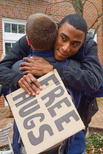 OU students embrace V-Day with free hugs  