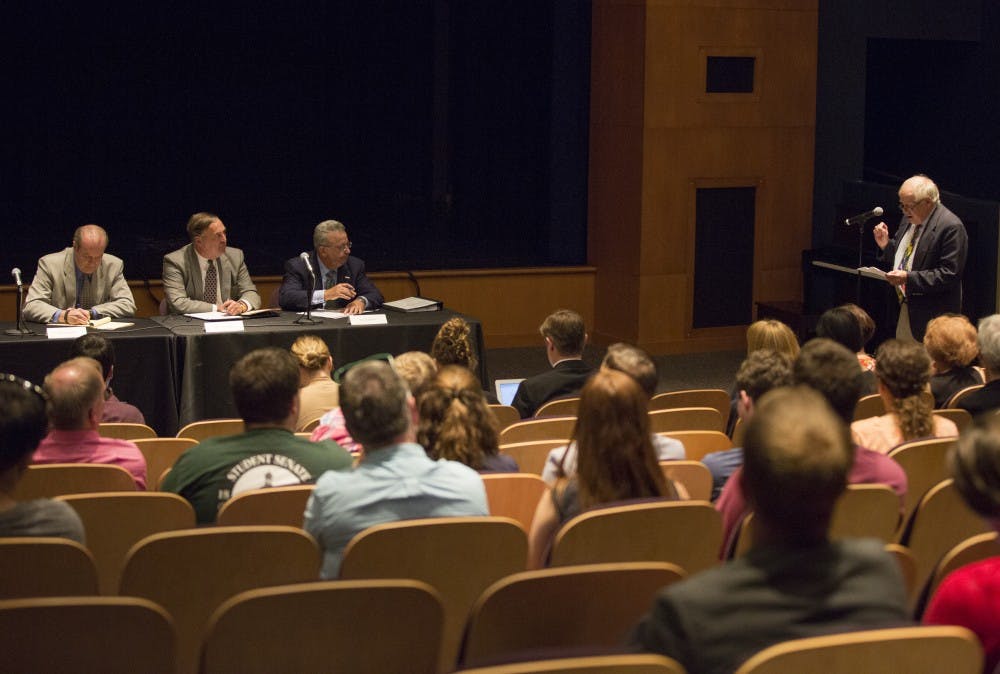 Richard Vedder, right, an economics professor, speaks during the presidential search forum in Baker Theater on Aug. 30, 2016. Vedder shared how he wants the next president of Ohio University to bring the university to its full potential. (EMILY MATTHEWS | PHOTO EDITOR)