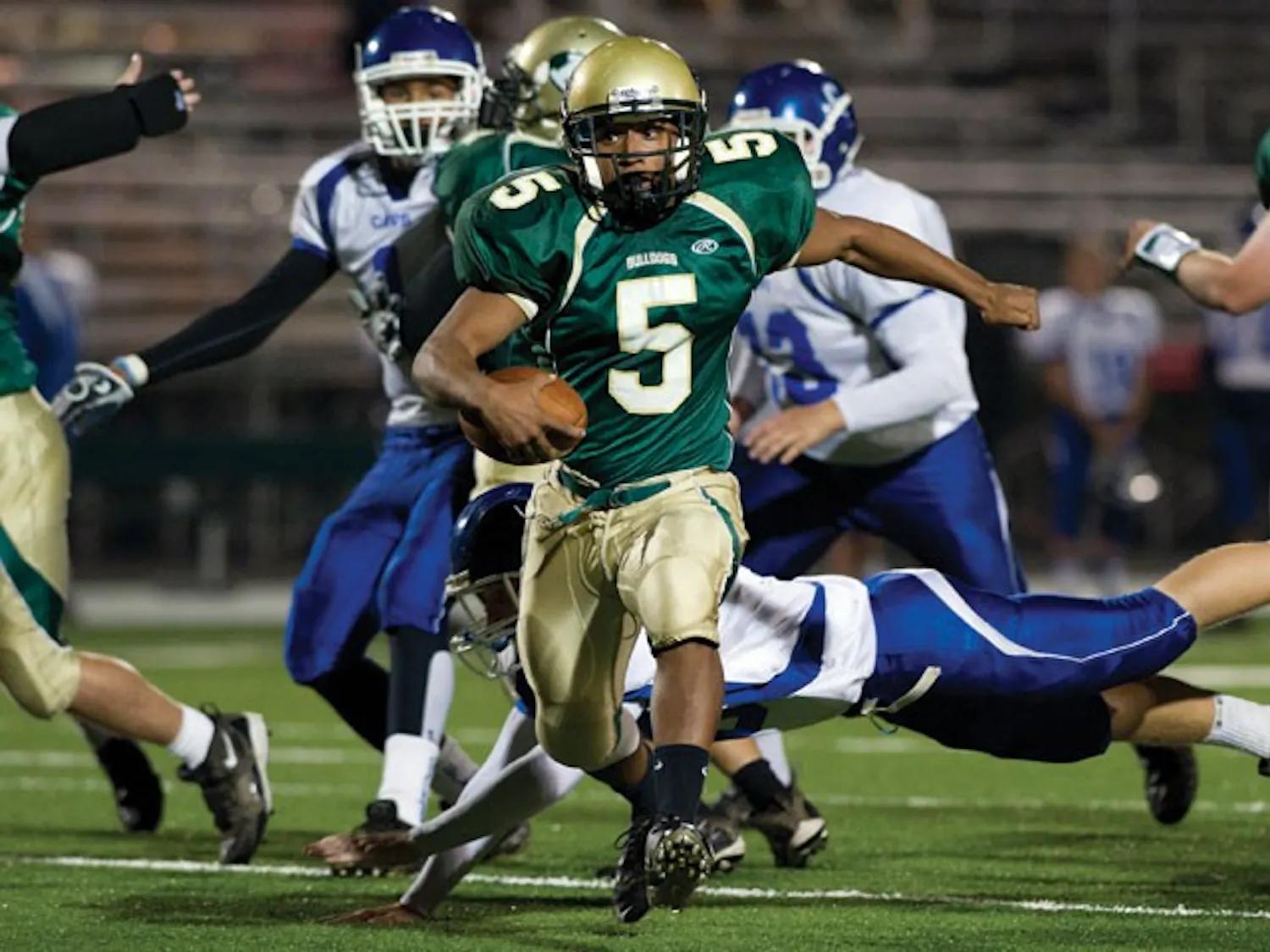 High School Football: Bulldogs struggle with fumbles, gain footing for win