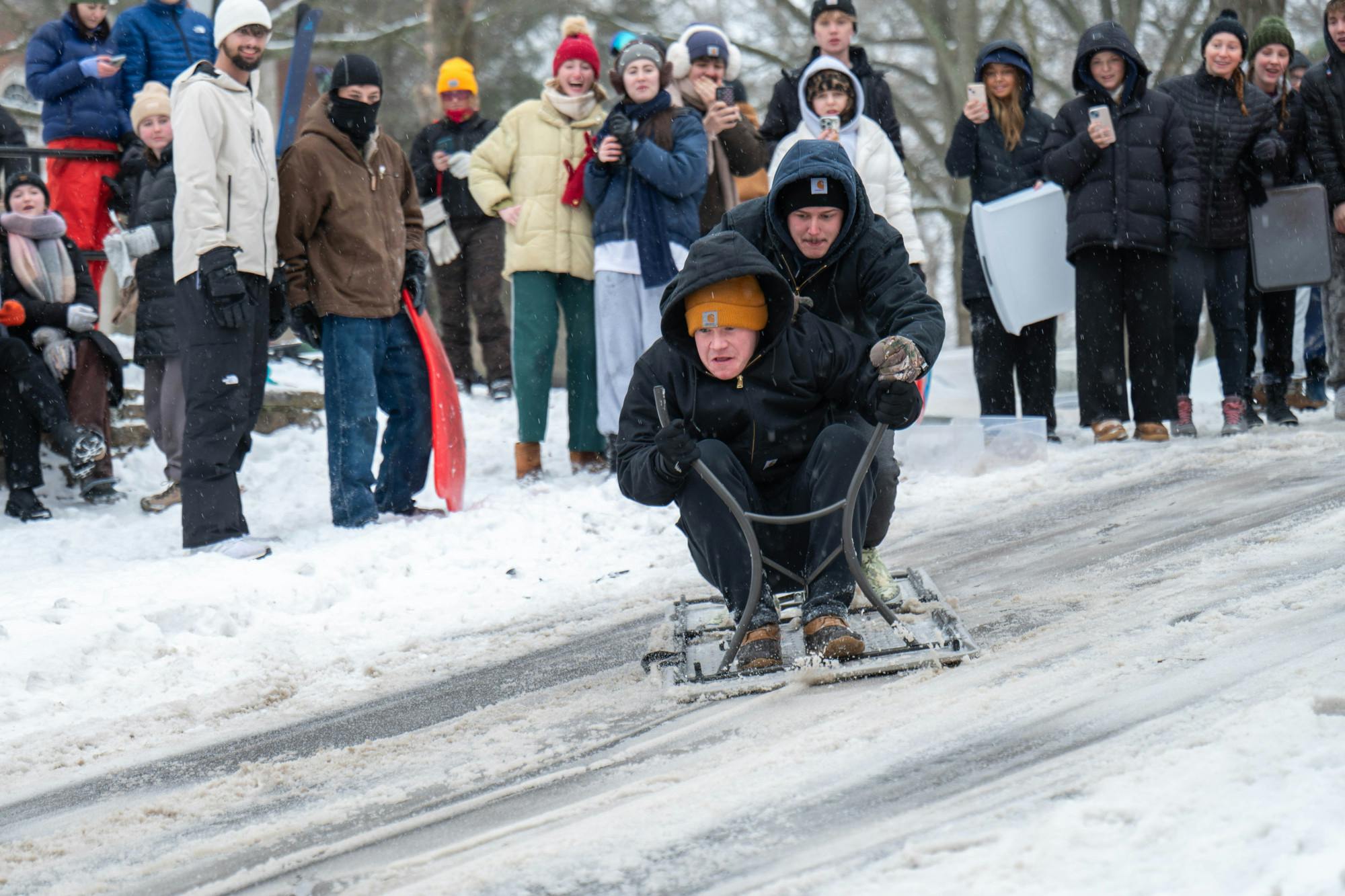 Students sled, ski during winter storm