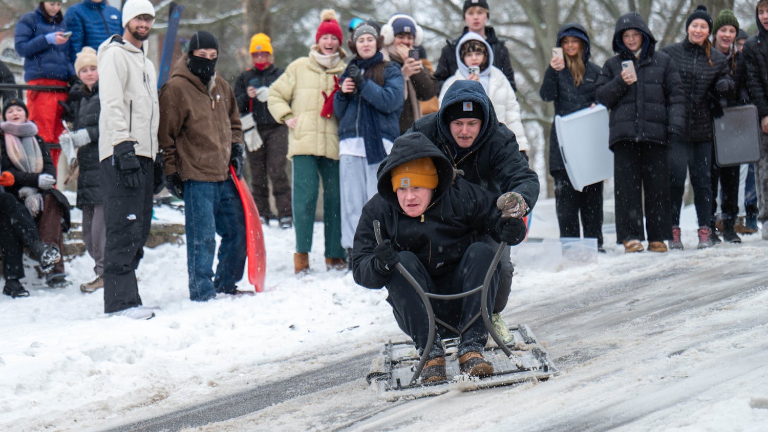 Students sled, ski during winter storm