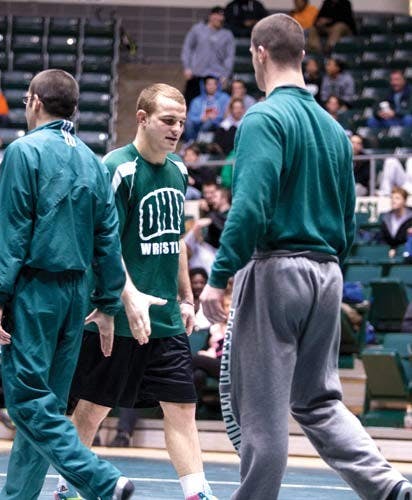 Wrestling: Bobcat pins down winning routine  