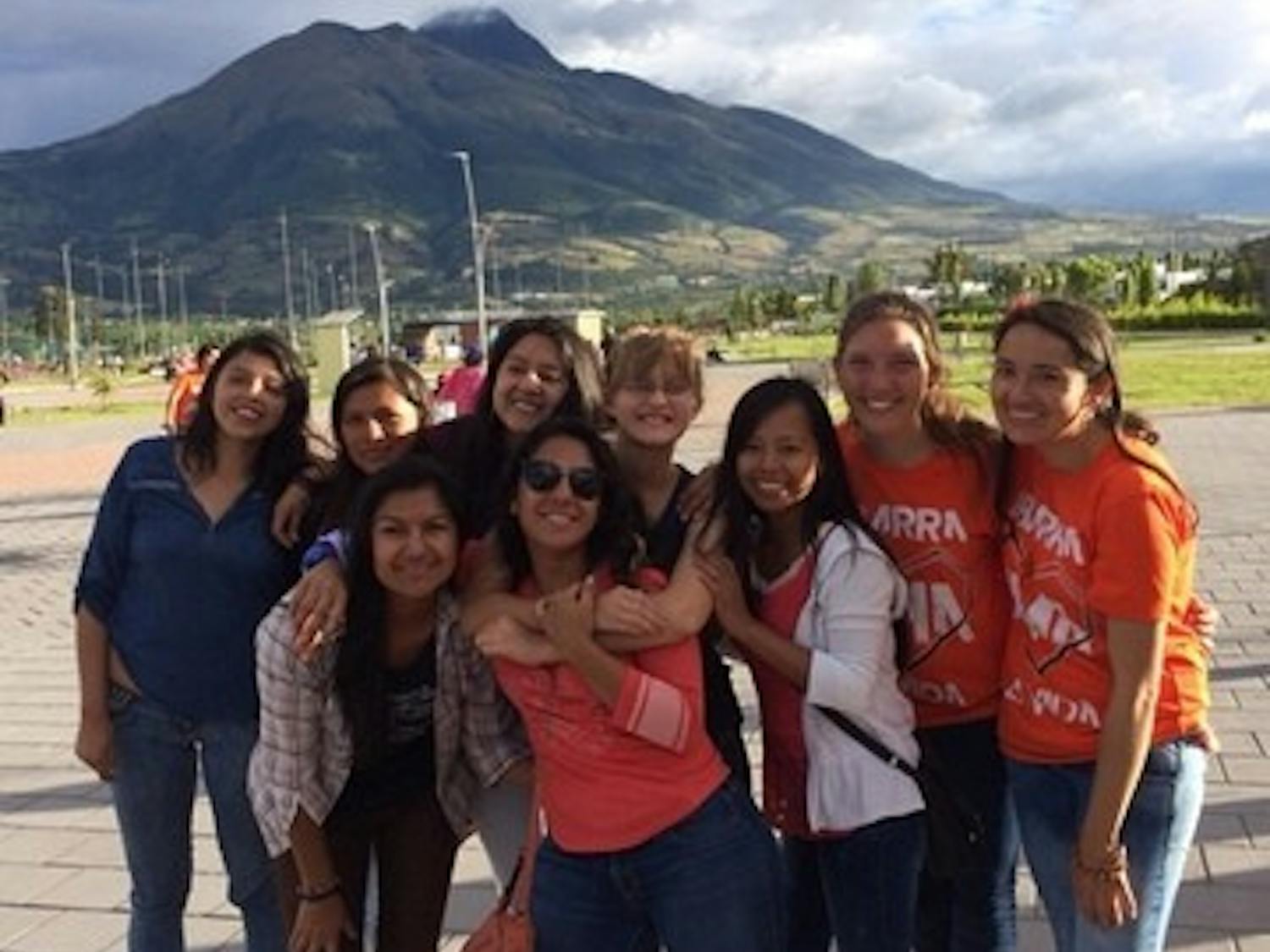 Lauren Farnsworth, center, poses with friends she made during her gap year in Ecuador