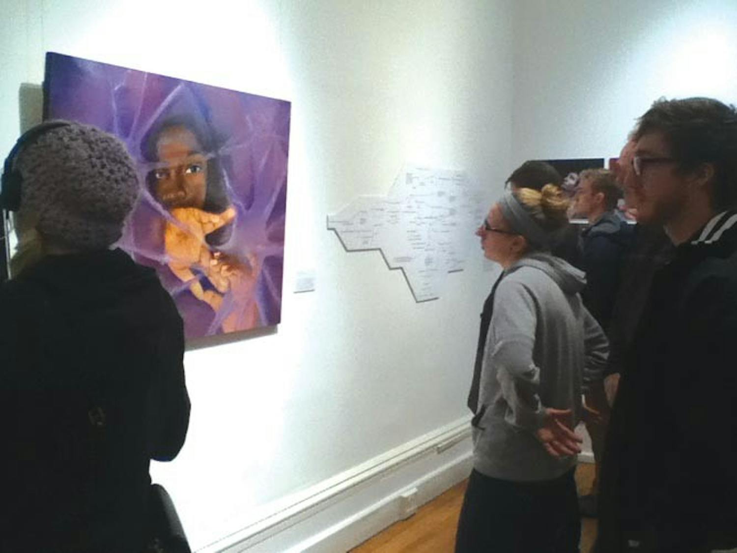 Kennedy displays student artwork with metaphysical, apocalyptic themes