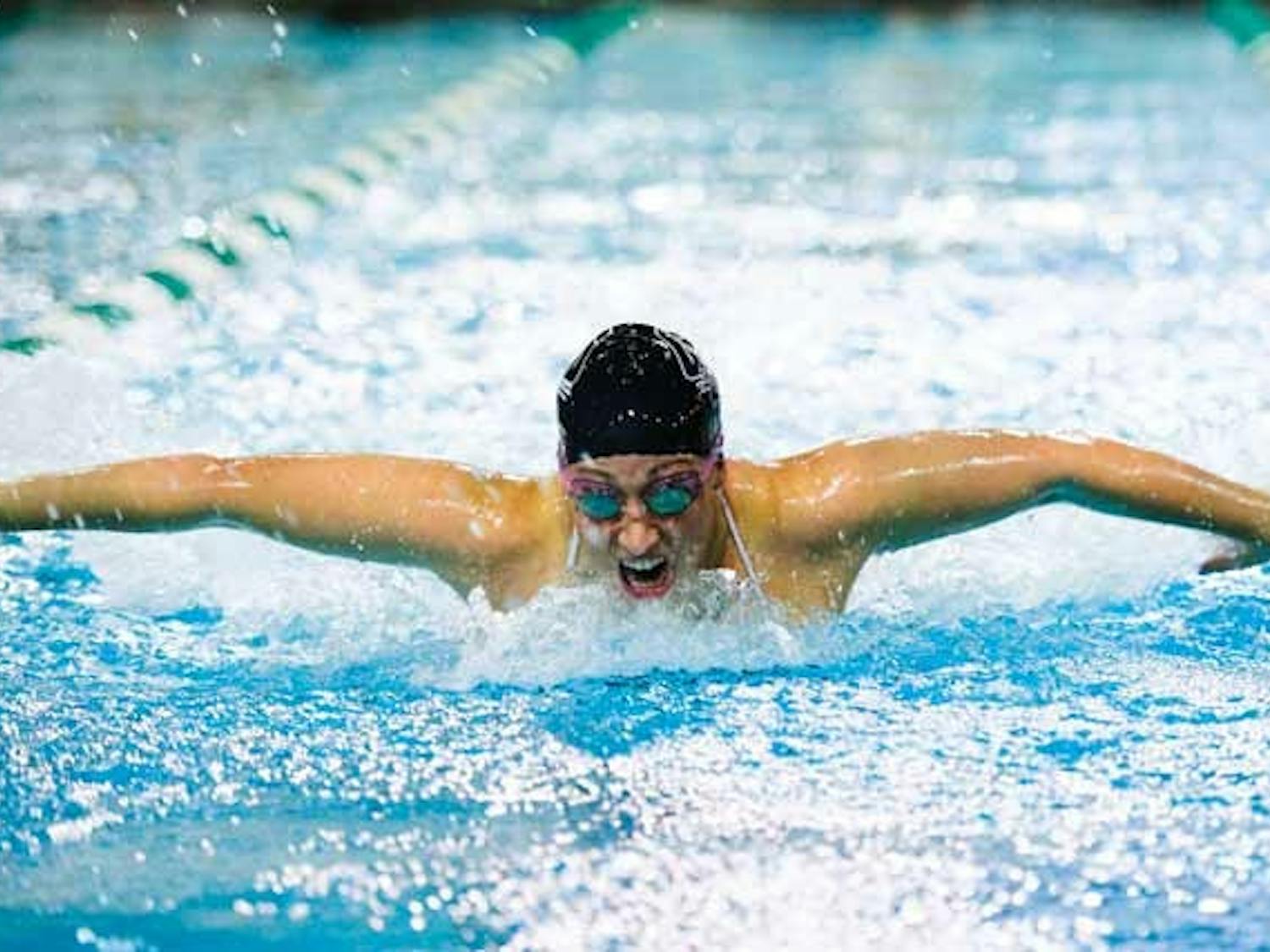 Swimmers forego winter break for extra hours in the pool