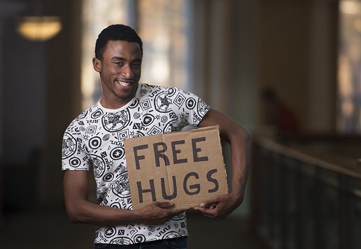 Student will be spreading the love with free hugs  