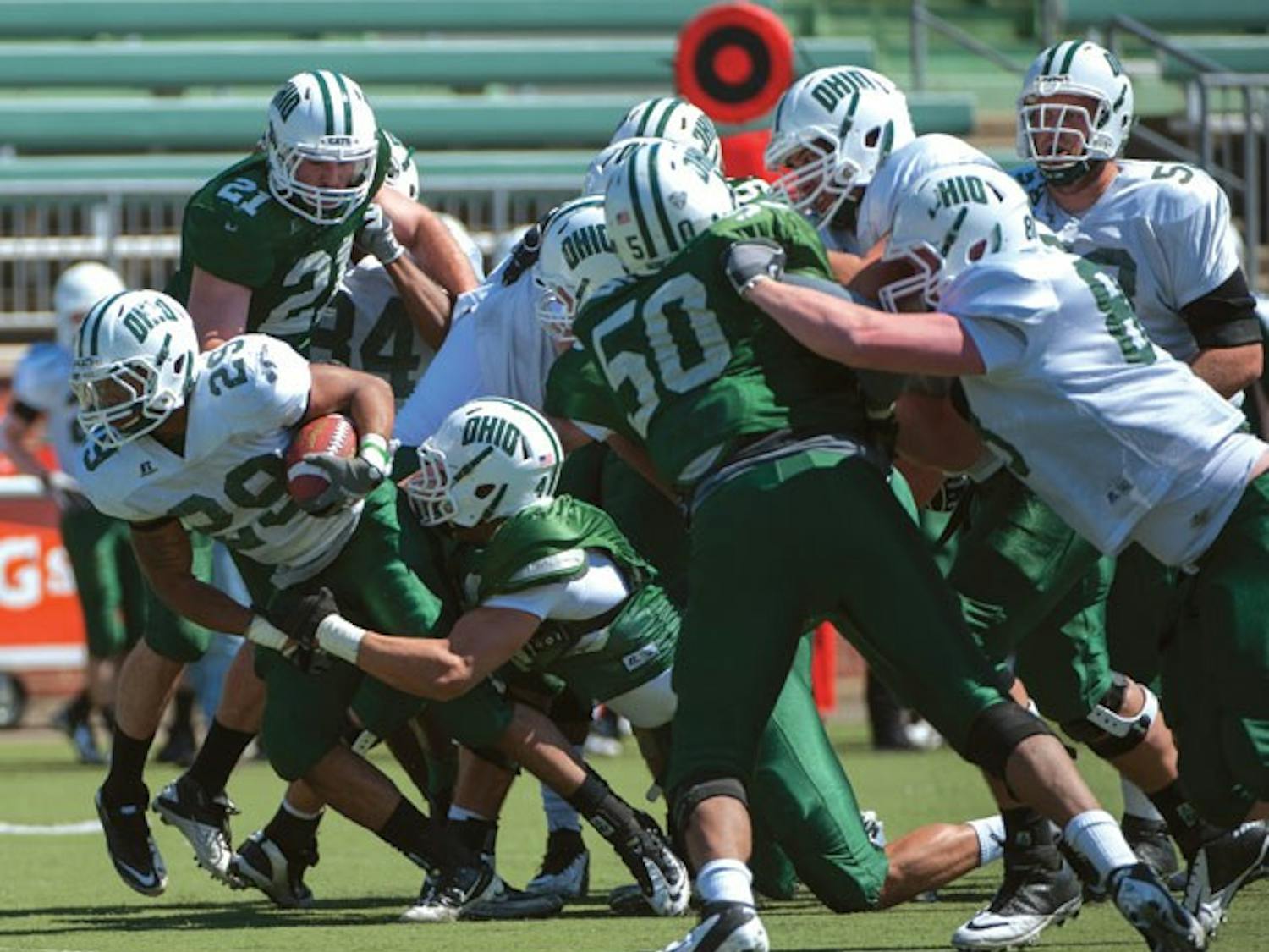 Football: Injuries affect play of annual Green and White Game  
