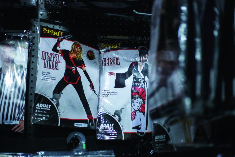 These costumes from Spirit of Halloween on E State Street in Athens, Ohio, all exhibit cultural appropriation. The “borrowing” or displaying of a culture as if it is a costume or amusing and taking it as your own is significantly higher during the season of Halloween and many people fail to see these distinctions when deciding upon a costume. (HANNAH SCHROEDER | FOR THE POST)