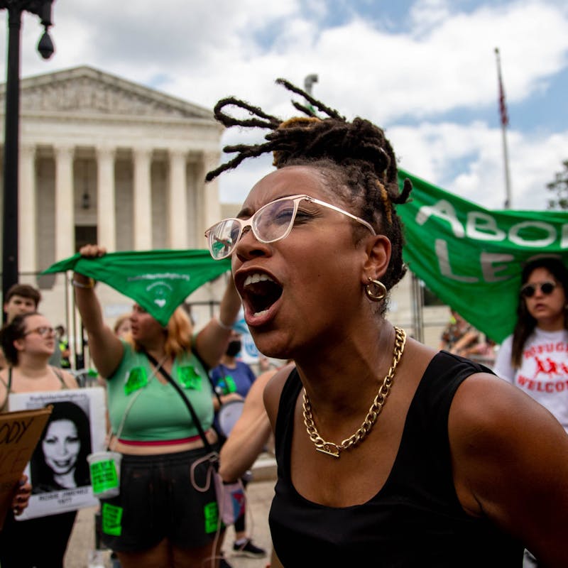 PHOTOS: People outside the Capitol react to the decision to strike down Roe V. Wade