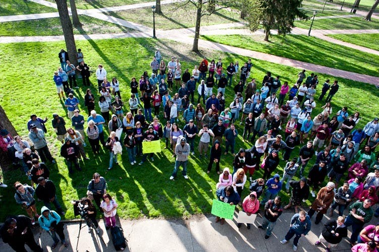 250 students gather to protest shooting of black teen  