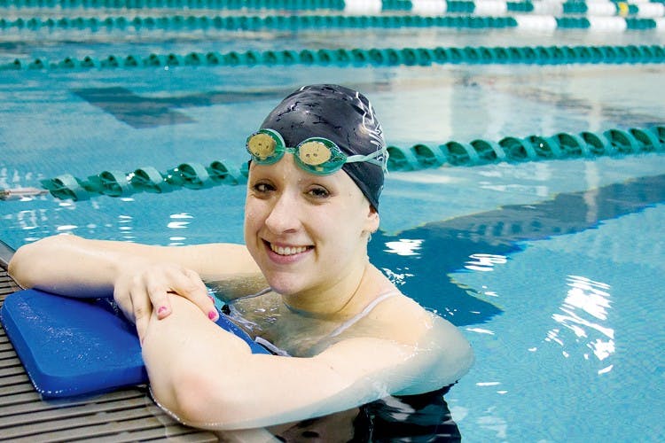 Rigorous routine takes distance swimmer to the top  