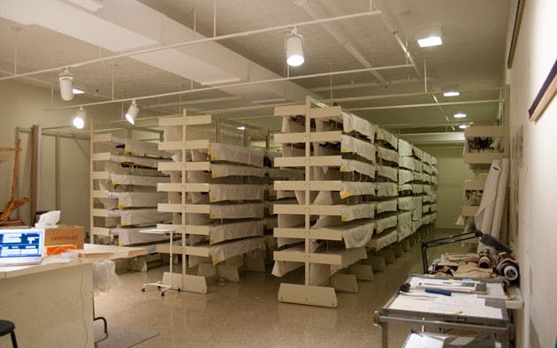 OU preparing protection for artwork damaged during bad weather  