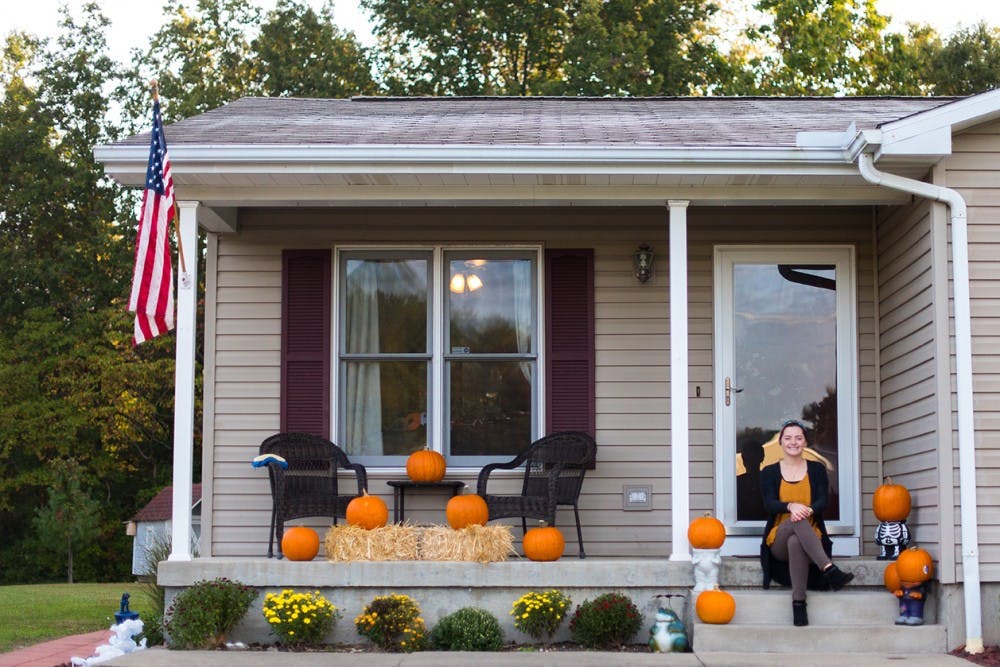 Karli Davis, a  sophomore studying sociology, poses for a portrait on the front steps of her house before leaving for class on October 11, 2016. Davis is a commuter student and lives at home with her family in The Plains. (EMMA HOWELLS | PHOTO EDITOR)