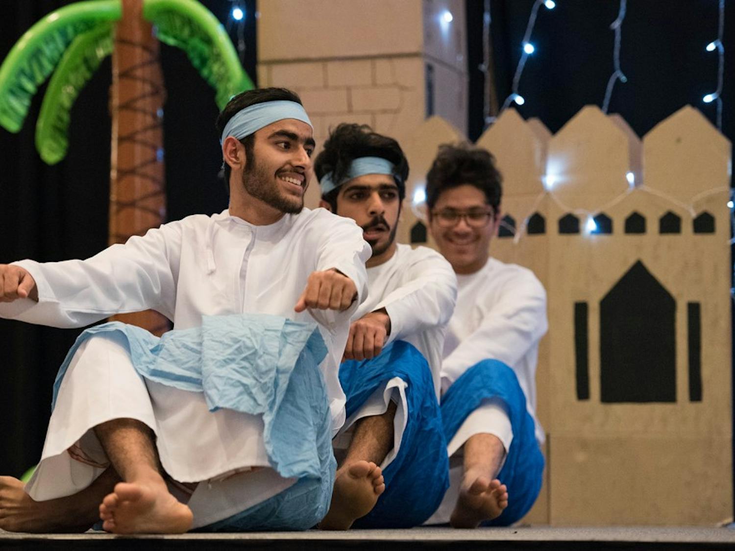 Members of the Arabic Language Student Association perform a traditional dance during Arabian Night in Baker Ballroom on Thursday.