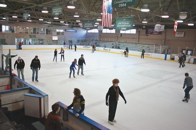 Parents and students skate, laugh, dance  