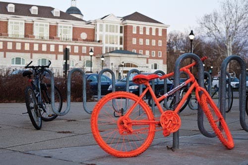 Bright orange bikes peddle local rental agency  