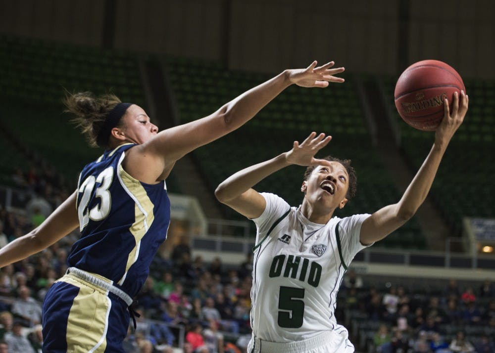 Ohio sophomore guard Quiera Lampkins tries to put up a shot around Akron junior guard DiAndra Gibson during their MAC game at the Convocation Center. (CARL FONTICELLA | FOR THE POST) 