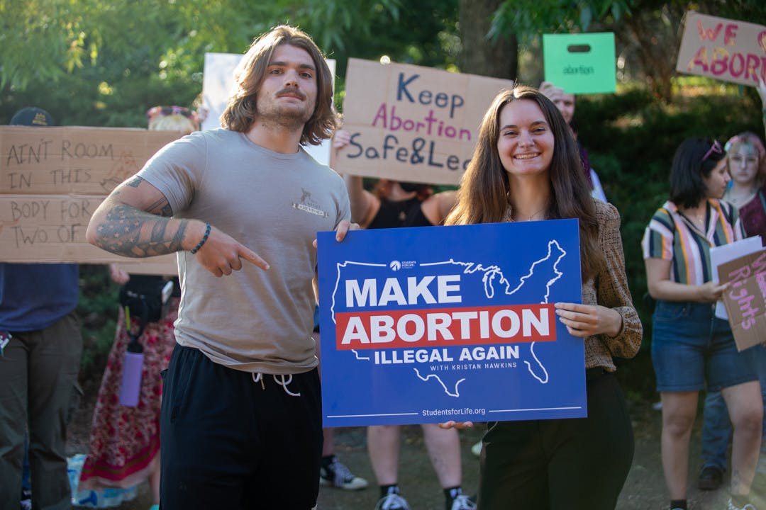 Anti-abortion protesters draw crowds to College Green