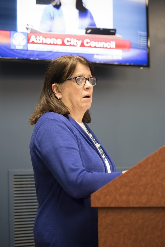 Athens City auditor Kathy Hecht speaks at a city council meeting on August 22, 2016. (CAMILLE FINE | FOR THE POST)