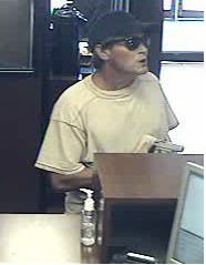 Chase bank held up at gunpoint; suspect at large  