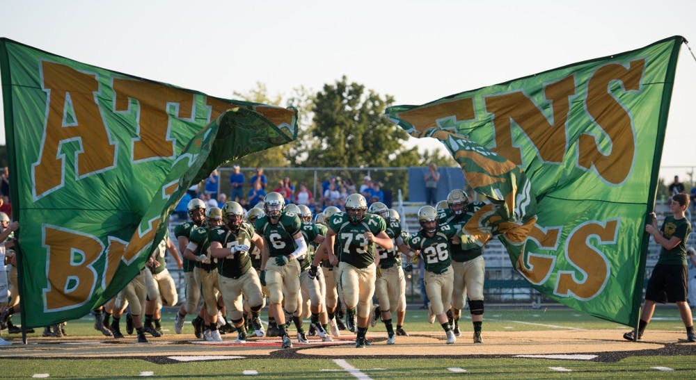 Players run out onto the feild right before kickoff in R. Basil Rutter Field on August 26th 2016 MATT STARKEY|FOR THE POST