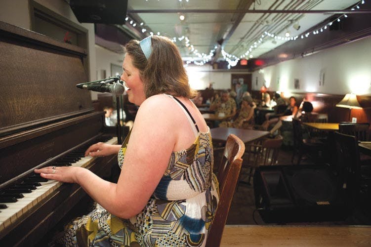 Local bards band together to aid folk maestro  