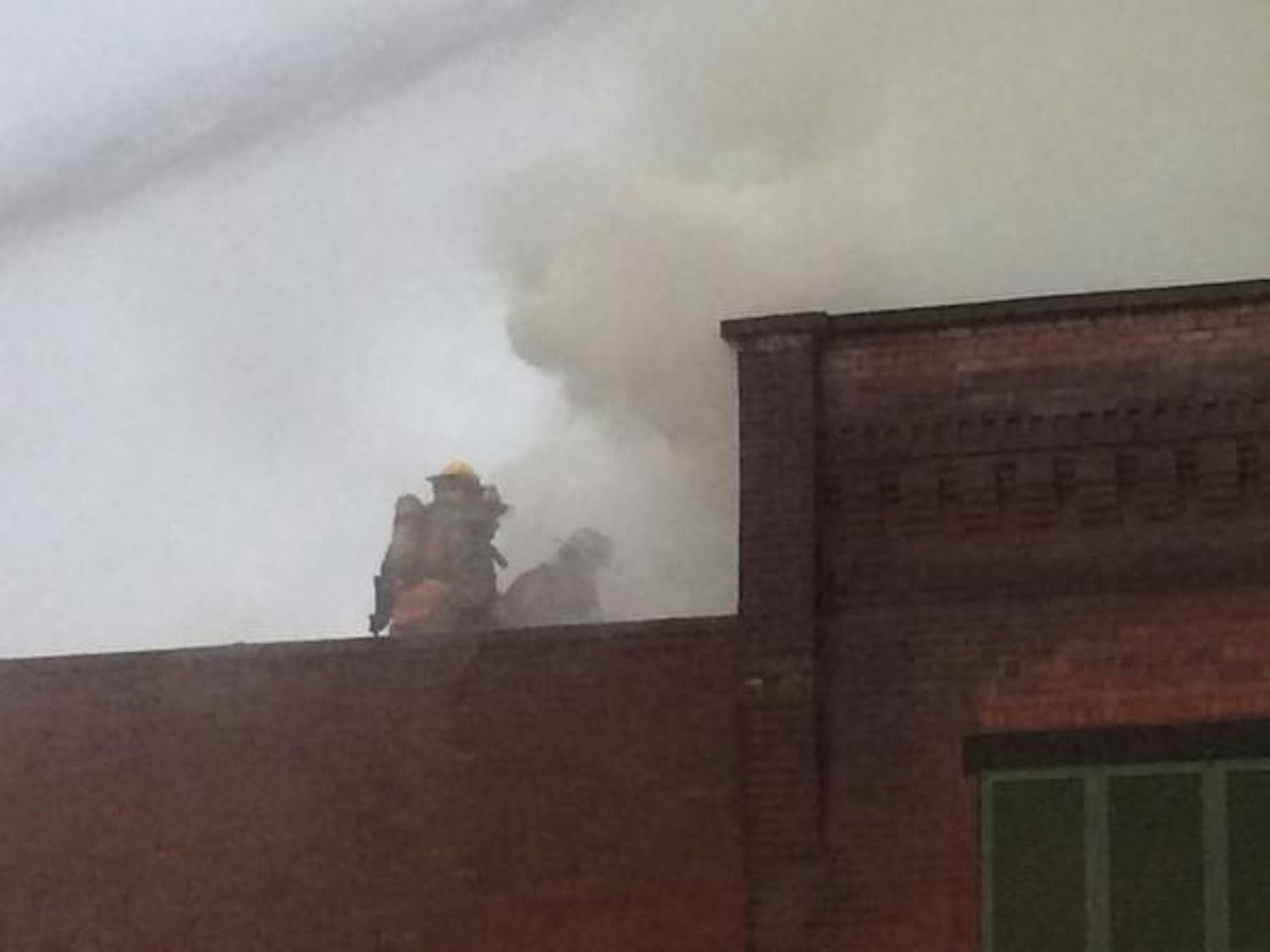 Athens Uptown Fire: Rooftop Firefighters  