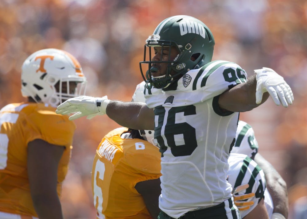 Ohio redshirt junior defensive lineman Kevin Robbins celebrates his sack of Tennessee quarterback Joshua Dobbs during their game at Neyland Stadium in Knoxville, Tennessee. 