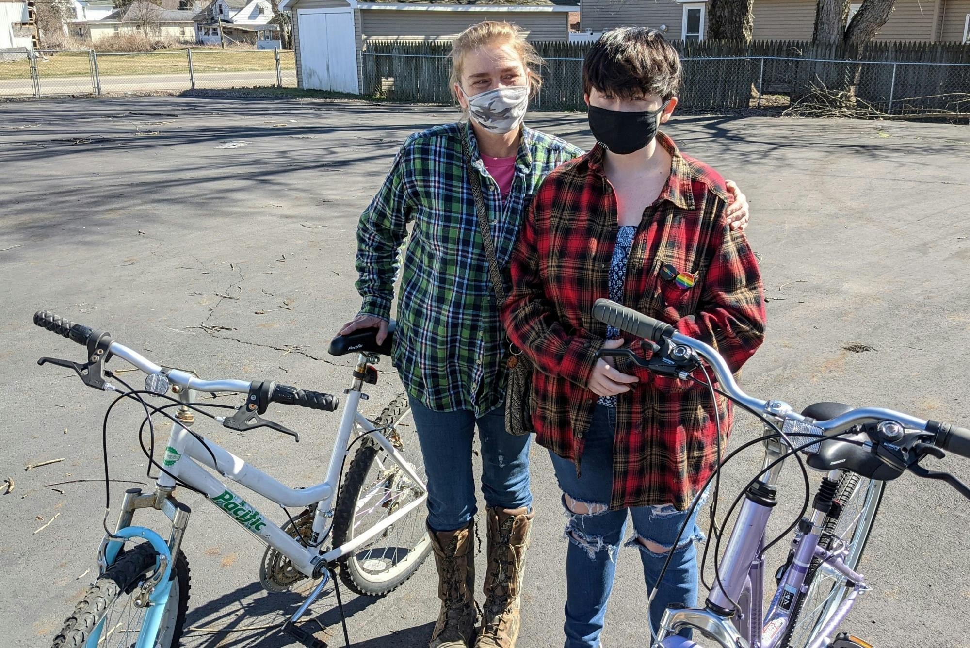 Re-Cycle - Chauncey residents pose with their new-to-them bicycles.jpg