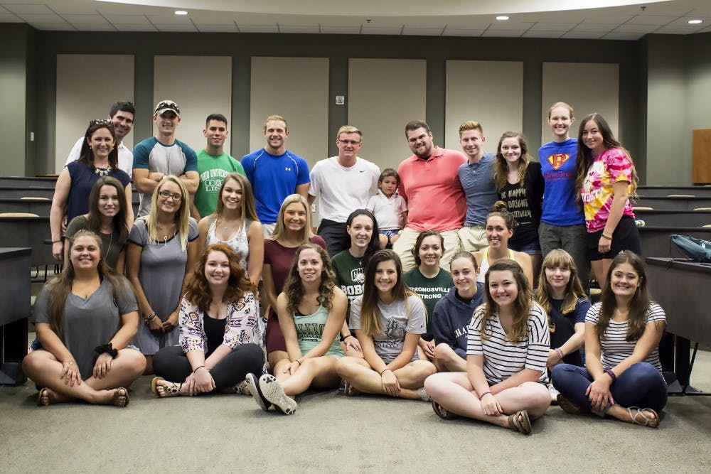 Members of Project FTK taking a group photo with the Norrod Family, who came to speak about their journey with pediatric cancer on September 10, 2016. (LAILA RIAZ | FOR THE POST)