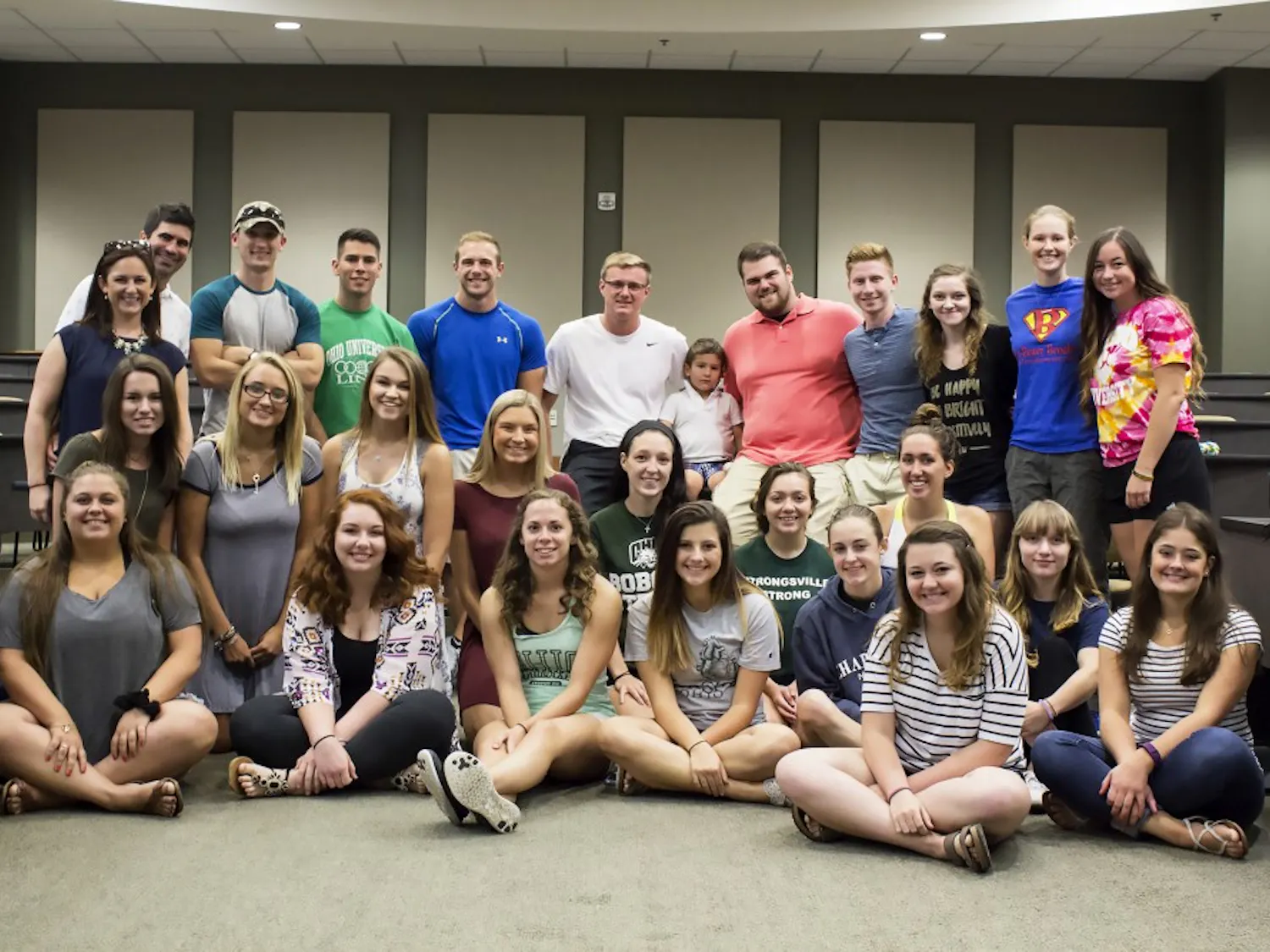 Members of Project FTK taking a group photo with the Norrod Family, who came to speak about their journey with pediatric cancer on September 10, 2016. (LAILA RIAZ | FOR THE POST)