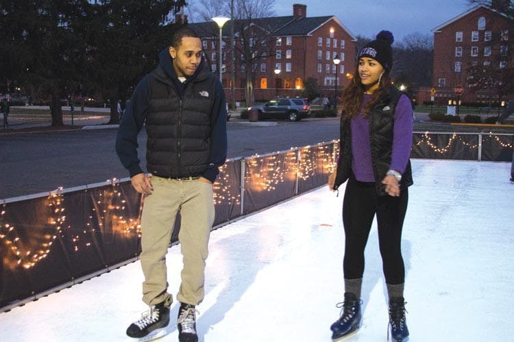 Parking lot plays host to holiday party, artificial ice rink  