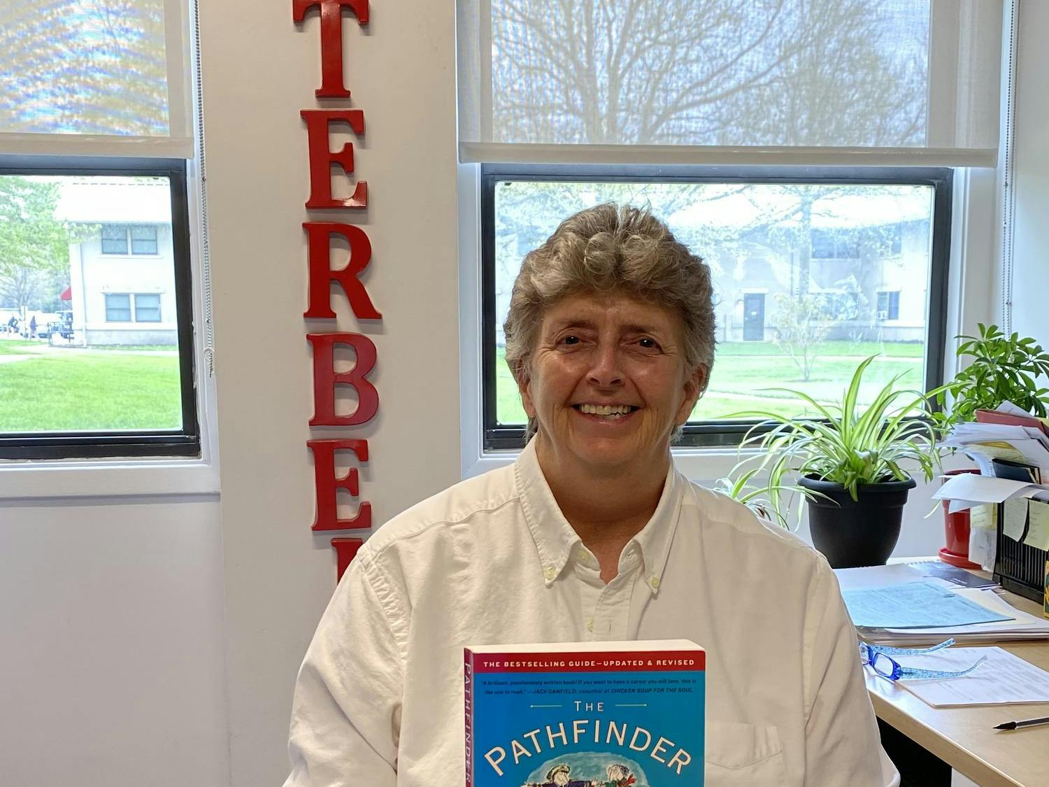 Dr. Walter with the Pathfinder Book