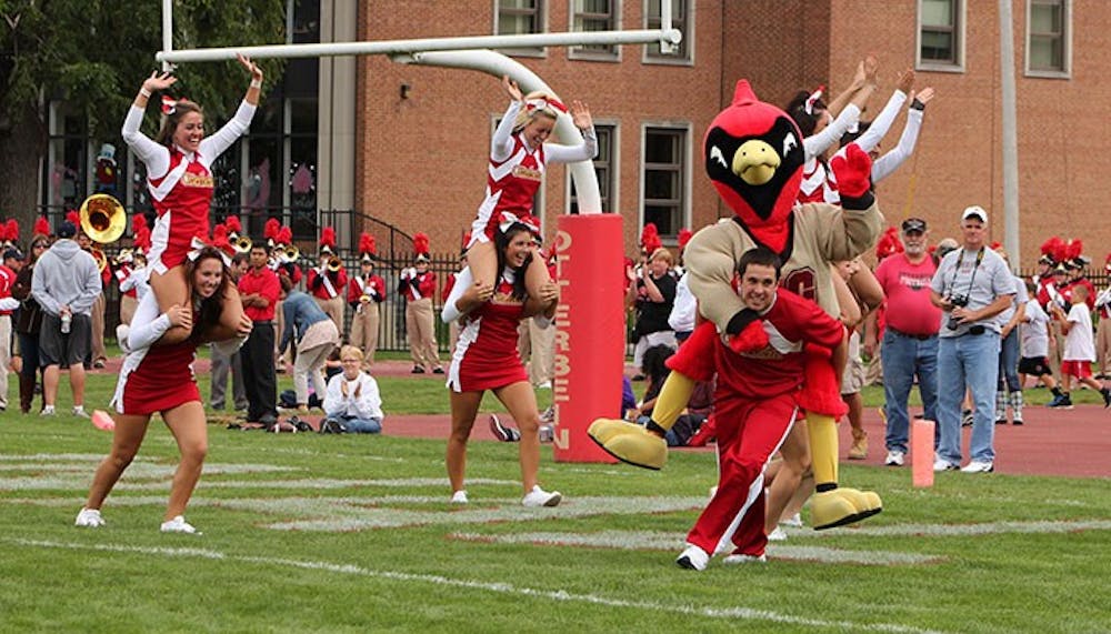 	<p>The cheerleaders and Cardy rushed the field.</p>